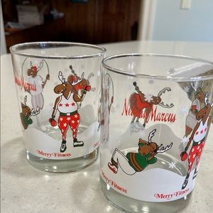 SOLD. Two fun Christmas Neiman Marcus drinking glasses.